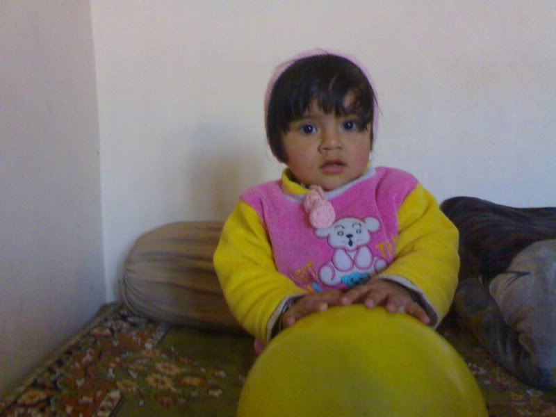 Cute baby playing with boll