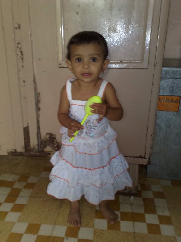 Sweetu Playing with Toy