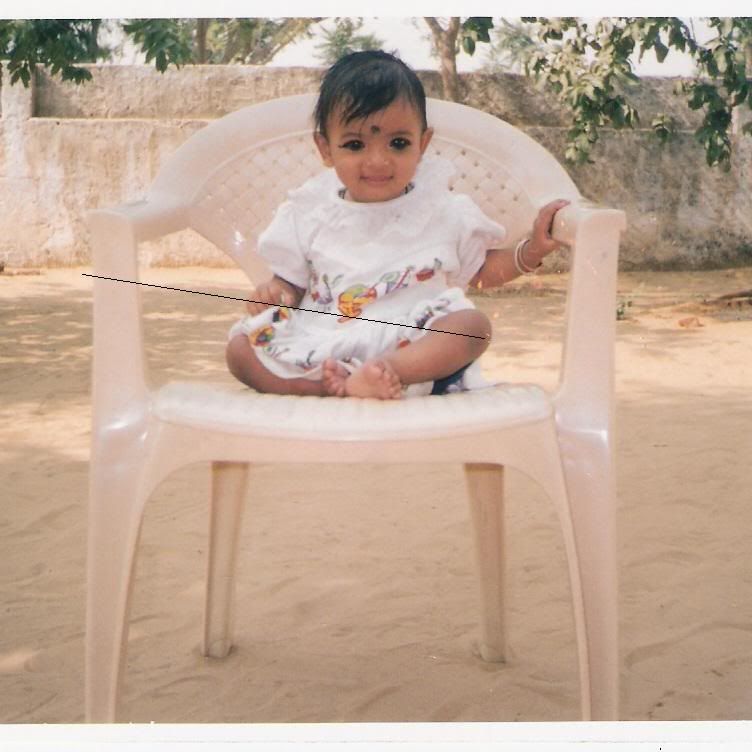 Cute baby smiling in chair